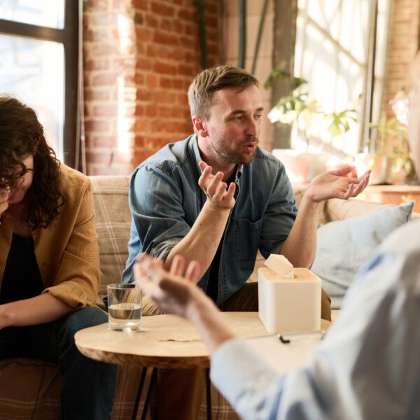Couple discussing their problems with psychologist